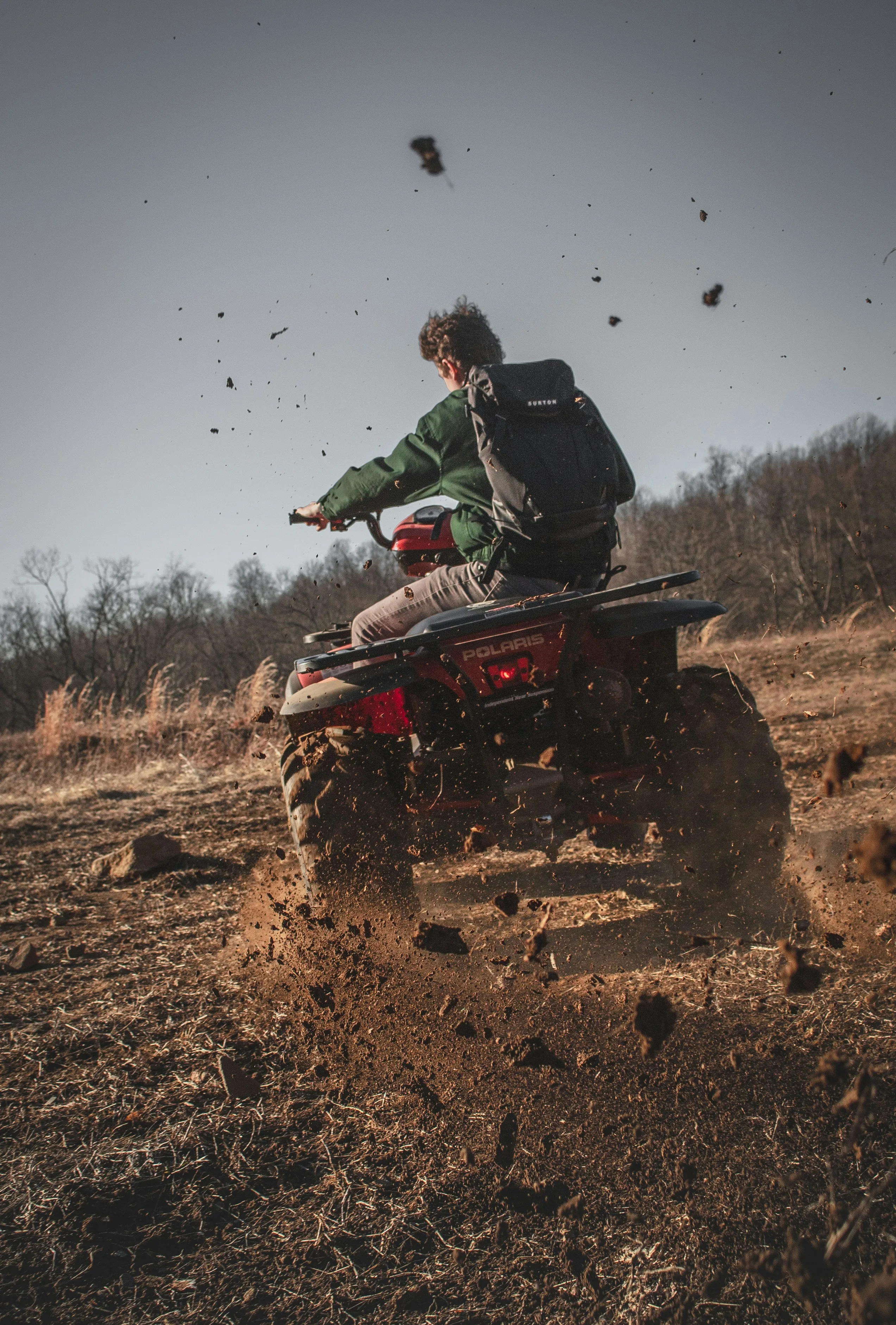 ATV on a mountain trail at sunset